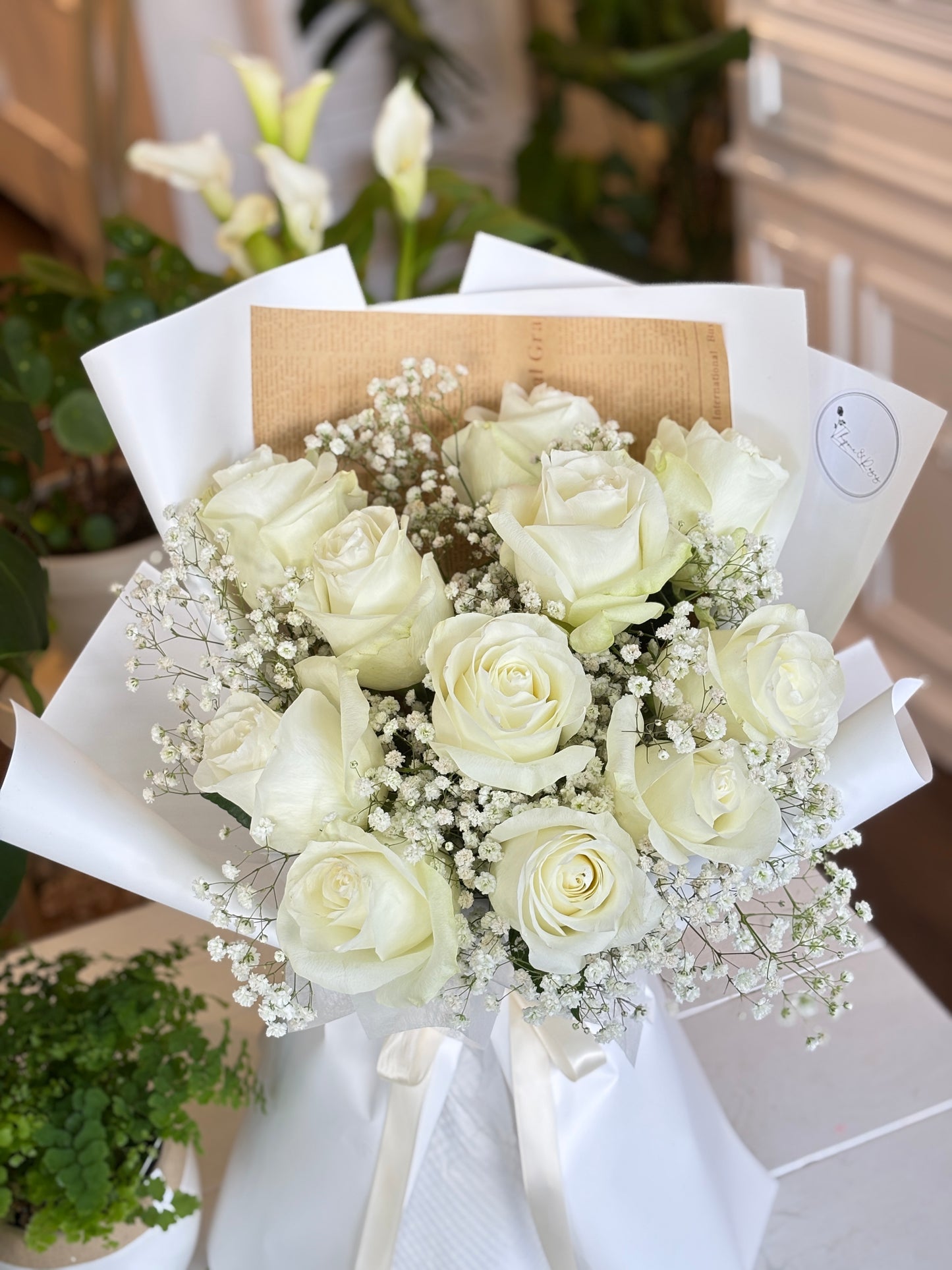 11 White Roses & Baby Breath