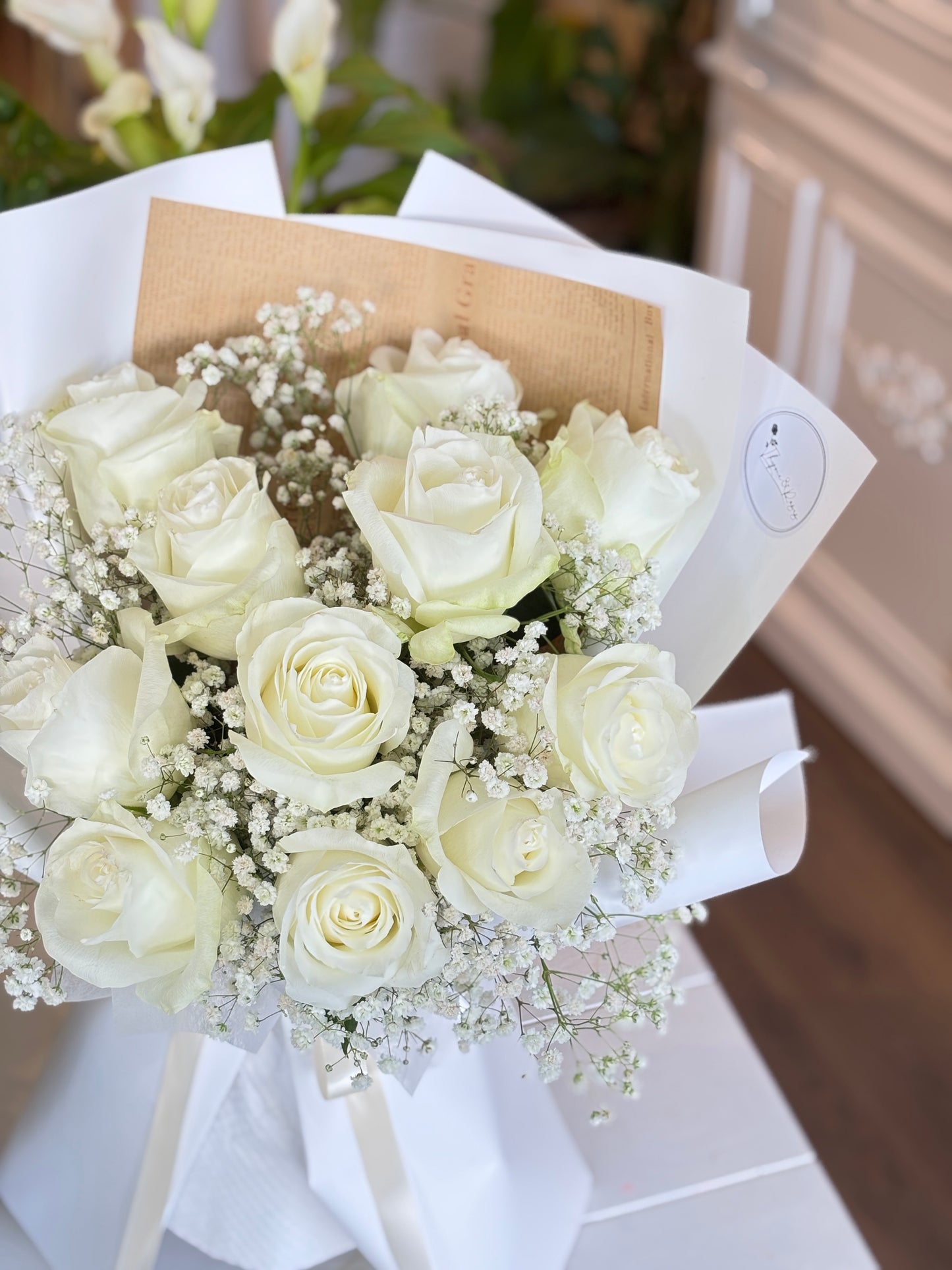 11 White Roses & Baby Breath