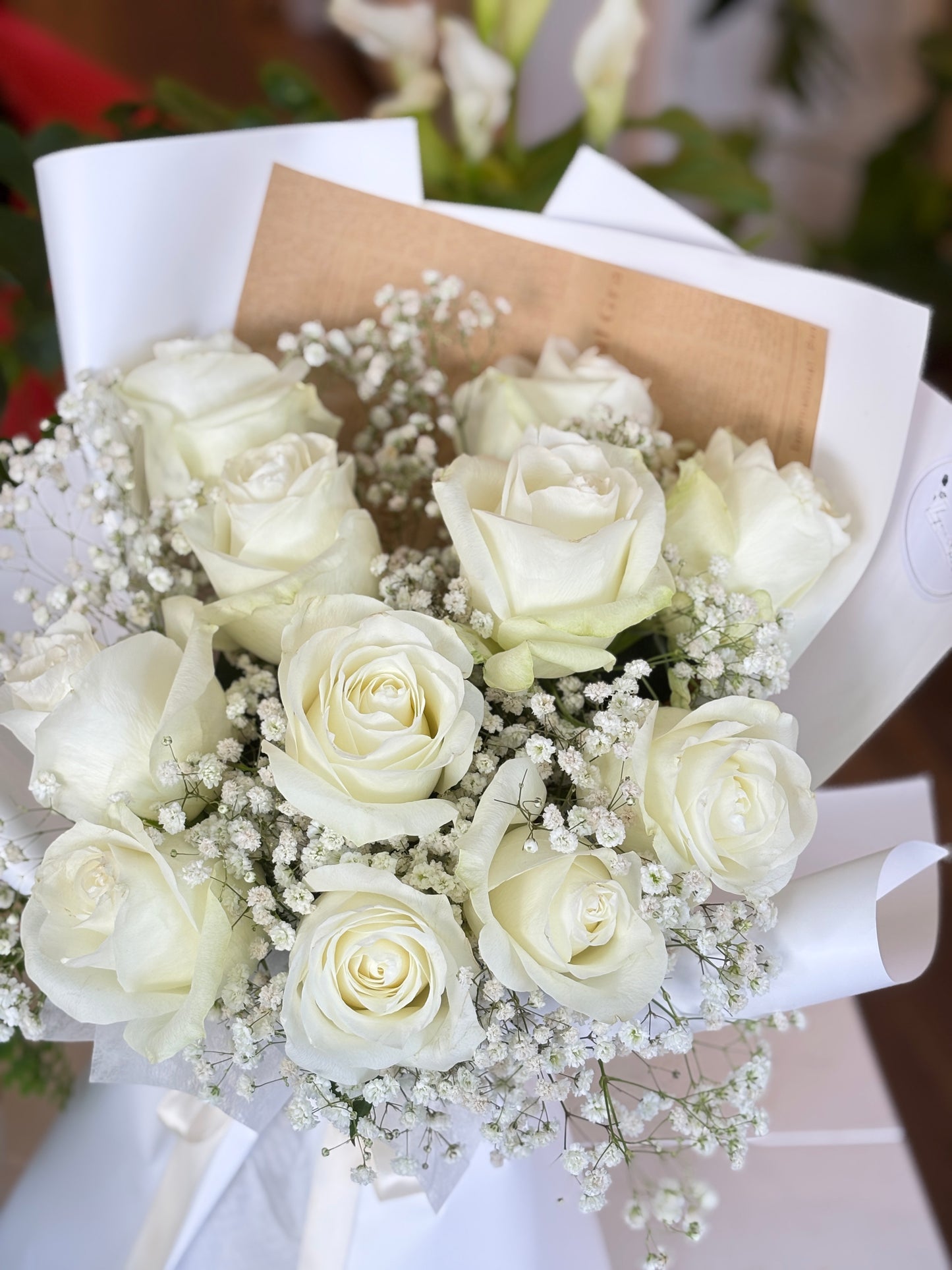 11 White Roses & Baby Breath
