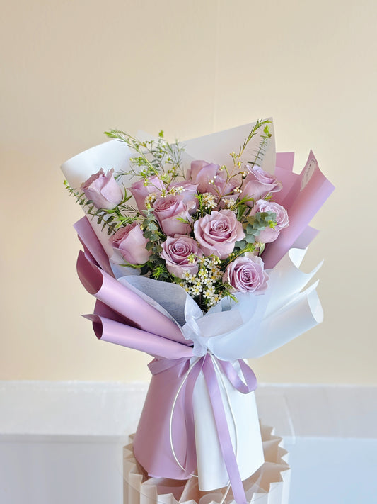 12 Purple roses bouquet