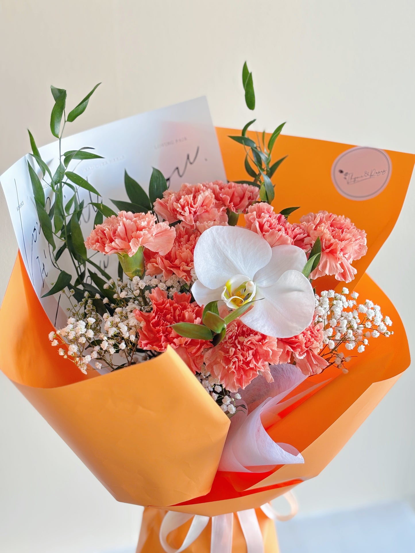 Mother's Day Bouquet - 9 Orange Carnations + Phalaenopsis