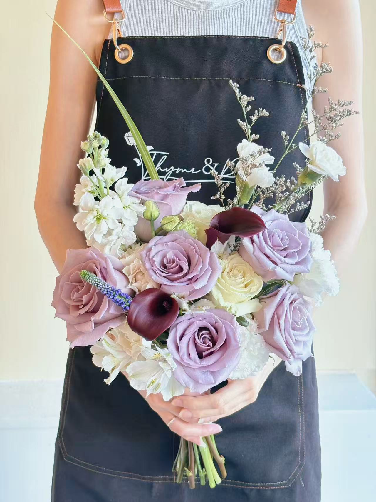 Front-facing Bridal Bouquet-Purple roses