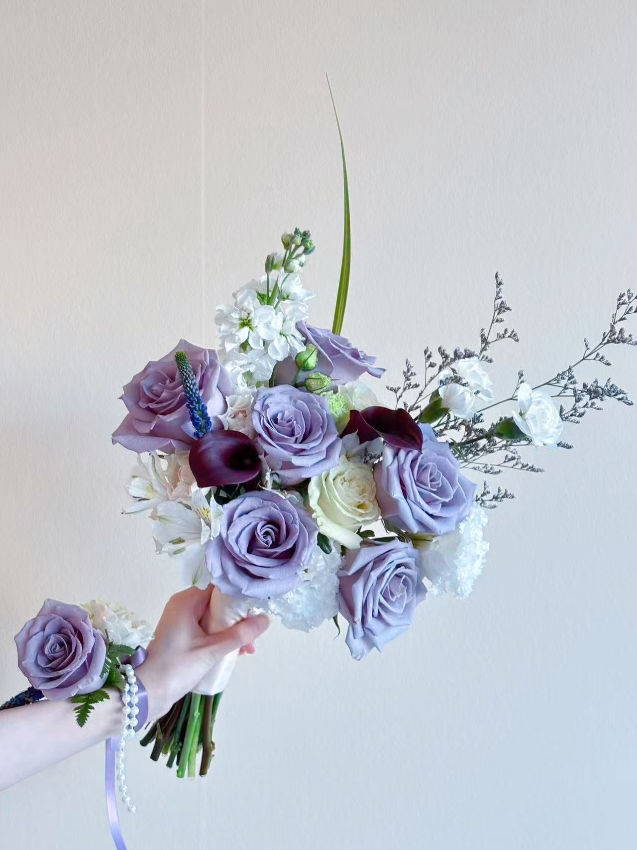 Front-facing Bridal Bouquet-Purple roses