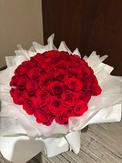 Pure Passion-33 red roses with white wrapping bouquet