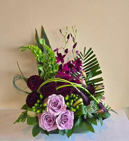 Purple front desk floral arrangement
